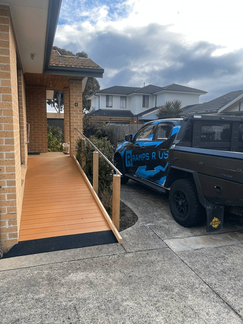 Timber wheelchair ramp with handrails Timber wheelchair ramp with handrails built along a Melbourne driveway